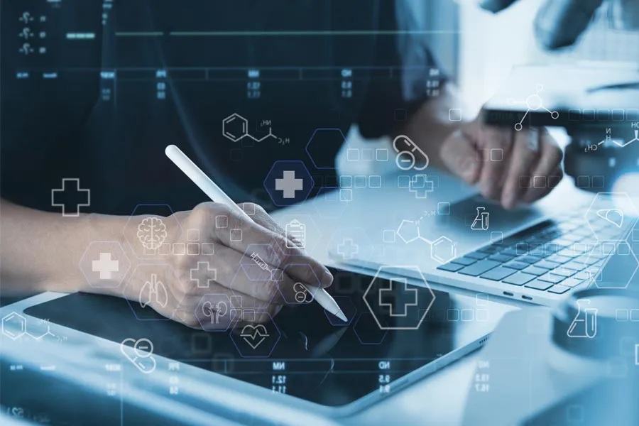 Health-Conditions-Treated-Doctor Close-up of a medical professional using a laptop and tablet, with illustrated medical symbols overlayed on the image, symbolizing health conditions treated by Kane Lai, MD in Dallas-Fort Worth Metroplex.