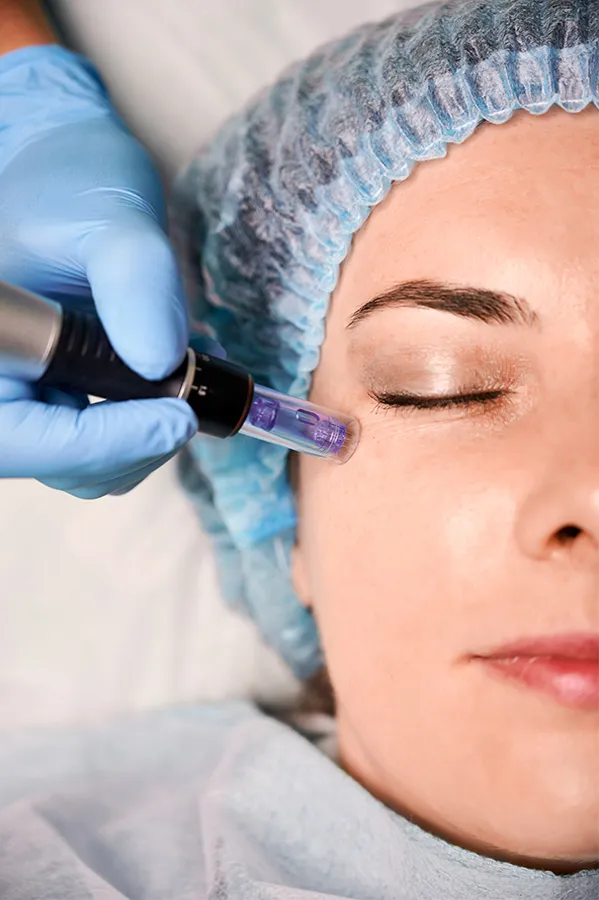 Peptides-for-Skin-and-Aesthetics-Treatment A woman receiving peptide therapy to her face. Get peptides for Skin and Aesthetics from Kane Lai, MD in Dallas-Fort Worth Metroplex.
